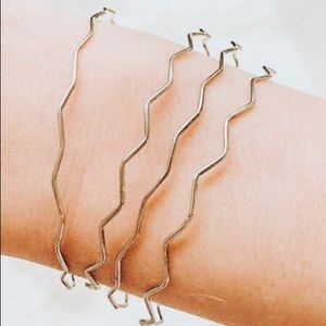 Set of 4 geometric silver bangles